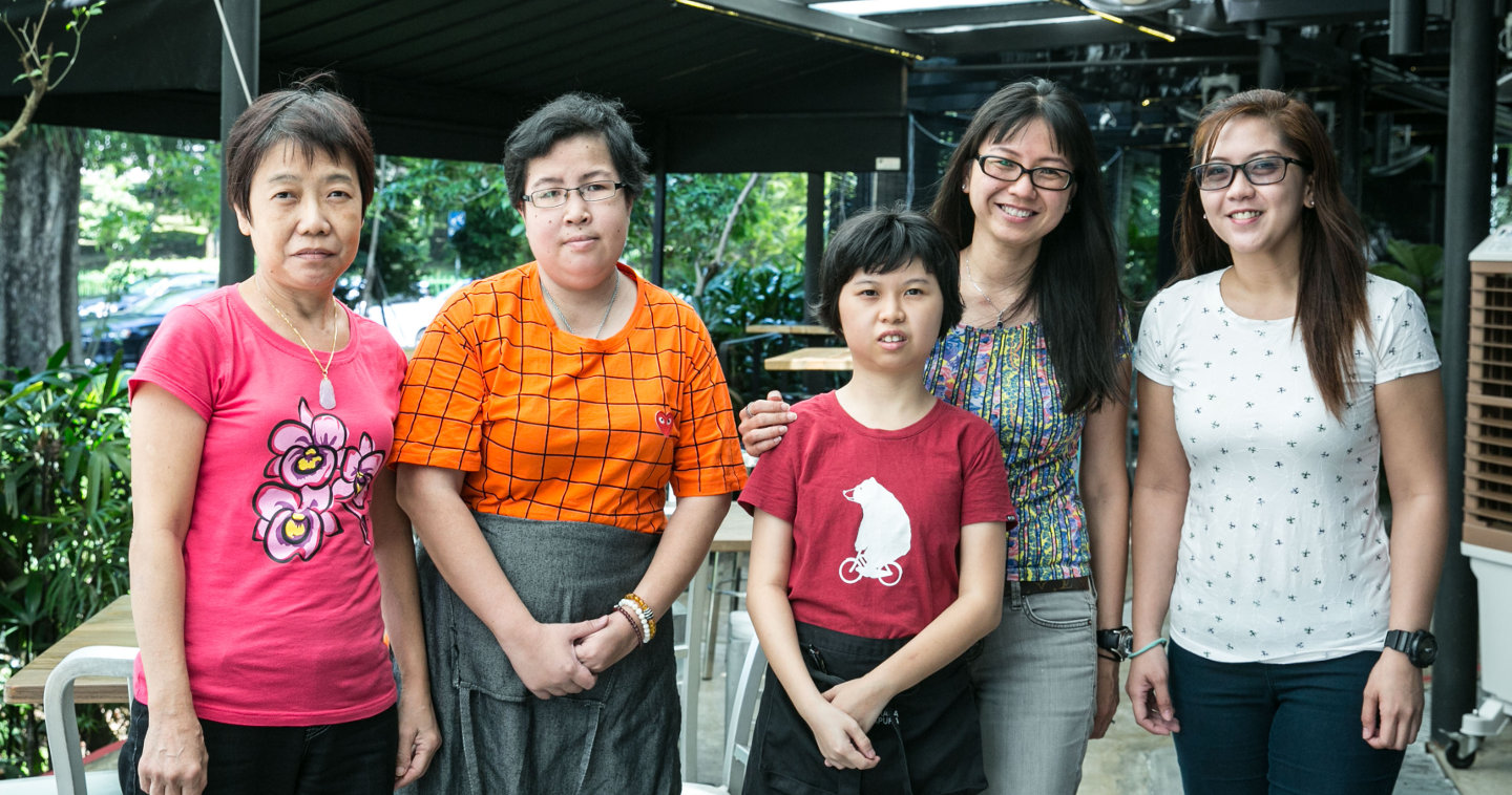 Photo of Josephine with the staff of New Rasa Singapura