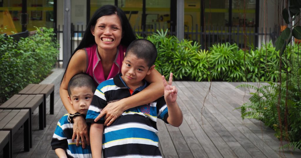 Photo of Madam Wong and her two sons