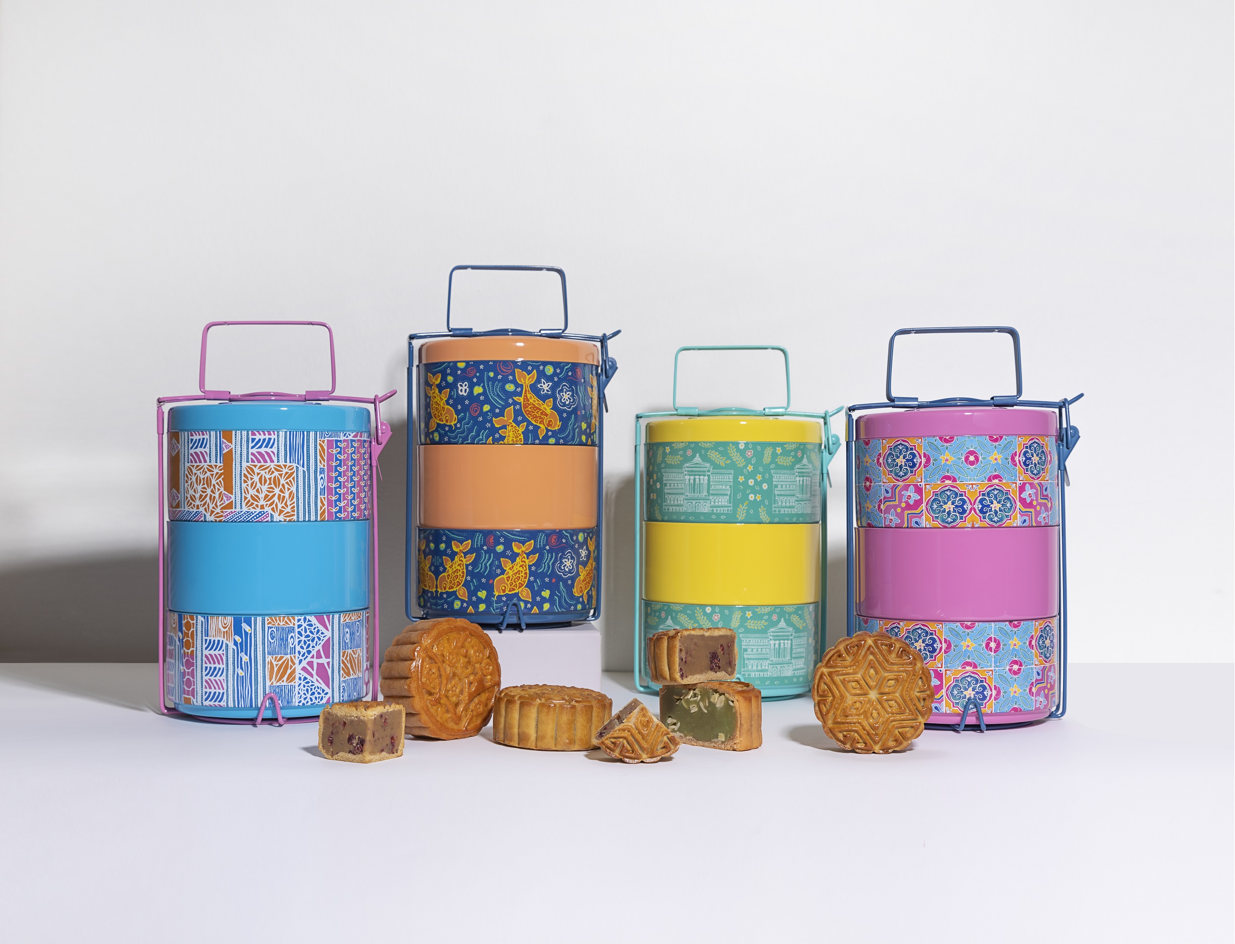 The 3-tier tiffin carrier gift sets are available in four different designs